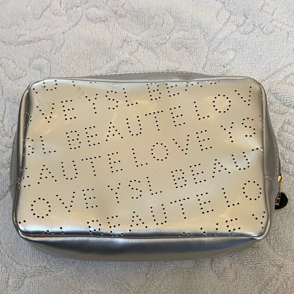 Yves Saint Laurent Metallic Silver Pouch​​​
